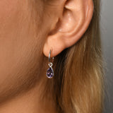 Fine hoop studs with pear amethyst