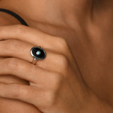 Oval black onyx & blue topaz ring (14mm x 10mm)