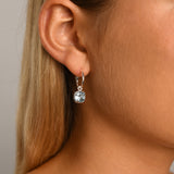 Fine open hoop studs with square blue topaz