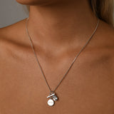Fine box chain necklace with pear blue topaz & toggle