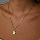 Fine box chain necklace with round St Christopher