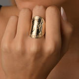 Curved coin ring