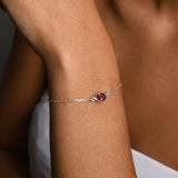 Adjustable bracelet with oval garnet