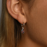 Fine hoop studs with pear garnet