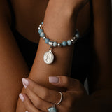 Larimar stretchy bracelet with sixpence
