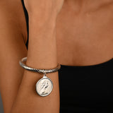 Twisted bangle with (1966) 50c Coin