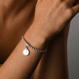 Stretchy bracelet with mini coin